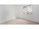 Bright bedroom with large window provides natural light and neighborhood views at 29606 N Tatum Blvd # 121, Cave Creek, AZ 85331