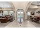 Elegant clubhouse featuring arched doorways, a lounge, and dining areas at 29606 N Tatum Blvd # 121, Cave Creek, AZ 85331