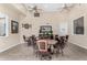 Bright game room includes multiple tables and chairs for social gatherings and activities at 29606 N Tatum Blvd # 121, Cave Creek, AZ 85331
