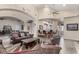 Comfortable lounge area offers couches, seating, a bar, and stylish interior design elements at 29606 N Tatum Blvd # 121, Cave Creek, AZ 85331