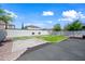 View of a backyard featuring an empty lawn with block wall, and patio space at 3144 W Maya Way, Phoenix, AZ 85083