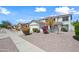 Charming two-story home with a two-car garage and beautiful desert landscaping at 3144 W Maya Way, Phoenix, AZ 85083
