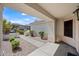 Inviting covered front porch with desert landscaping and stone accents at 3144 W Maya Way, Phoenix, AZ 85083