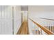 Second floor hallway featuring wood floors and white trim at 3144 W Maya Way, Phoenix, AZ 85083