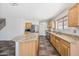 Spacious kitchen showcasing granite countertops, stainless steel appliances, and ample cabinet space at 3144 W Maya Way, Phoenix, AZ 85083