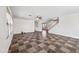 Large living room featuring tiled flooring, with a view to the staircase at 3144 W Maya Way, Phoenix, AZ 85083