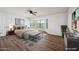 Inviting main bedroom featuring a bay window, ceiling fan, and neutral color palette at 3144 W Maya Way, Phoenix, AZ 85083