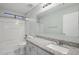 Bathroom with tub, toilet, and granite vanity countertop at 325 W Angus Rd, San Tan Valley, AZ 85143