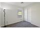 Neutral bedroom with carpet, sliding closet, and natural light at 325 W Angus Rd, San Tan Valley, AZ 85143