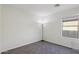 Cozy bedroom featuring plush carpet, natural light, and neutral tones at 325 W Angus Rd, San Tan Valley, AZ 85143