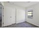 Bedroom with a sliding closet, carpeted floors, and natural light at 325 W Angus Rd, San Tan Valley, AZ 85143