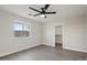 Bedroom with ceiling fan, natural light, and closet at 325 W Angus Rd, San Tan Valley, AZ 85143