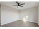 Bedroom with ceiling fan and light-toned wood floors at 325 W Angus Rd, San Tan Valley, AZ 85143