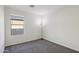 Clean bedroom featuring carpeted floors, natural light, and modern design at 325 W Angus Rd, San Tan Valley, AZ 85143