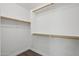 Bright closet features wood trim and shelving at 325 W Angus Rd, San Tan Valley, AZ 85143
