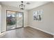 Eat-in kitchen area with sliding door access to the back patio and backyard at 325 W Angus Rd, San Tan Valley, AZ 85143