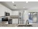 Bright, updated kitchen featuring stainless appliances, granite countertops and sleek white cabinetry at 325 W Angus Rd, San Tan Valley, AZ 85143