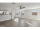 Bright living room leading to an eat-in kitchen with stainless steel appliances at 325 W Angus Rd, San Tan Valley, AZ 85143