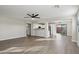 Open floor plan featuring living room, eat in kitchen and stainless steel appliances at 325 W Angus Rd, San Tan Valley, AZ 85143