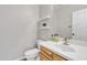 Clean and modern half bath with a stylish vanity and neutral decor at 3419 E Rosa Ln, Gilbert, AZ 85297