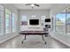 Bright and airy game room with a poker table and multiple screens at 3419 E Rosa Ln, Gilbert, AZ 85297