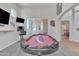 Game room with a poker table and access to the covered patio at 3419 E Rosa Ln, Gilbert, AZ 85297