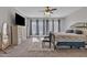 Inviting primary bedroom with natural light, plush rug, and elegant decor creating a relaxing retreat at 3419 E Rosa Ln, Gilbert, AZ 85297