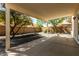 Covered back patio offers a spacious area for outdoor living and entertaining, with views of the low-maintenance yard at 399 W Buena Vista Dr, Tempe, AZ 85284