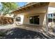 Back patio has convenient sliding door access, providing easy indoor-outdoor living and access to the landscaped backyard at 399 W Buena Vista Dr, Tempe, AZ 85284