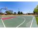 A community basketball court features well-maintained surfaces and hoops, providing a recreational space for residents to enjoy at 399 W Buena Vista Dr, Tempe, AZ 85284
