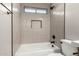 Contemporary bathroom features custom tile work, black hardware, and updated fixtures at 399 W Buena Vista Dr, Tempe, AZ 85284