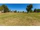 An expansive community park with sprawling lawns and mature trees provides a picturesque and inviting recreational space at 399 W Buena Vista Dr, Tempe, AZ 85284