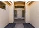Inviting front entrance with a sidelight framed front door, and stucco exterior at 399 W Buena Vista Dr, Tempe, AZ 85284