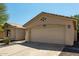 Charming single-story home with a neutral color scheme, desert landscaping, and a two-car garage at 399 W Buena Vista Dr, Tempe, AZ 85284