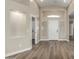 Spacious living room featuring wood-look flooring, ample natural light, and a modern design at 399 W Buena Vista Dr, Tempe, AZ 85284