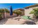 Backyard features a patio and desert landscaping at 44215 W Granite Dr, Maricopa, AZ 85139