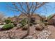 Well-kept single-Gathering home featuring desert landscaping, a two-car garage, and neutral color palette at 44215 W Granite Dr, Maricopa, AZ 85139