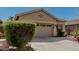 Beautiful single-level home boasting desert-style landscaping and a two-car garage at 44215 W Granite Dr, Maricopa, AZ 85139