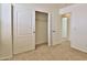 Bedroom includes a closet, neutral carpet, and neutral paint at 44917 W Zion Rd, Maricopa, AZ 85139