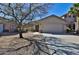 Charming single-story home featuring a two-car garage and low maintenance desert landscaping at 44917 W Zion Rd, Maricopa, AZ 85139