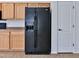 Close-up of kitchen appliances, refrigerator and cabinets at 44917 W Zion Rd, Maricopa, AZ 85139