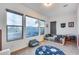 Charming Bedroom with natural light, playful decor, space-themed rug and ample room for play at 4606 S Ferric --, Mesa, AZ 85212