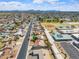 An aerial view of a well-maintained home with a long driveway in a friendly neighborhood at 5431 W Sierra St, Glendale, AZ 85304