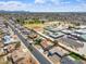 An aerial view shows a house in a friendly neighborhood next to a school and park at 5431 W Sierra St, Glendale, AZ 85304