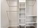 Walk-in closet with built-in shelving and hanging rods at 5431 W Sierra St, Glendale, AZ 85304