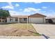 Charming single-story home with a well-maintained lawn and two-car garage at 5431 W Sierra St, Glendale, AZ 85304
