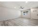 Bright living room featuring stylish flooring, ample natural light and a ceiling fan at 5431 W Sierra St, Glendale, AZ 85304
