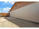 This side yard features low-maintenance gravel and secure privacy fencing at 5431 W Sierra St, Glendale, AZ 85304