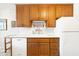 Well-lit kitchen featuring a sink, dishwasher, and ample cabinet space at 5525 E Thomas Rd # N5, Phoenix, AZ 85018