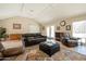 Comfortable lounge area with leather furniture and decor for residents to gather at 5525 E Thomas Rd # N5, Phoenix, AZ 85018